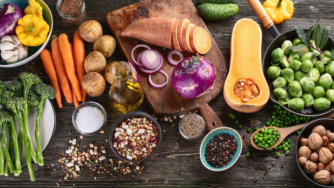 A colorful assortment of fresh vegetables, grains, and natural ingredients on a rustic wooden table representing whole-food nutrition and the best quality berberine for metabolic health support.