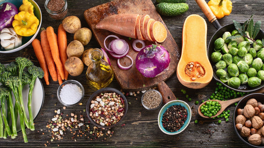 A colorful assortment of fresh vegetables, grains, and natural ingredients on a rustic wooden table representing whole-food nutrition and the best quality berberine for metabolic health support.